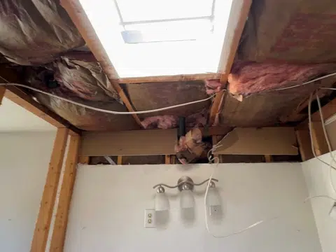 Bathroom remodel opened to studs with tub and exposed framing for index in Stanton shown from a different service angle