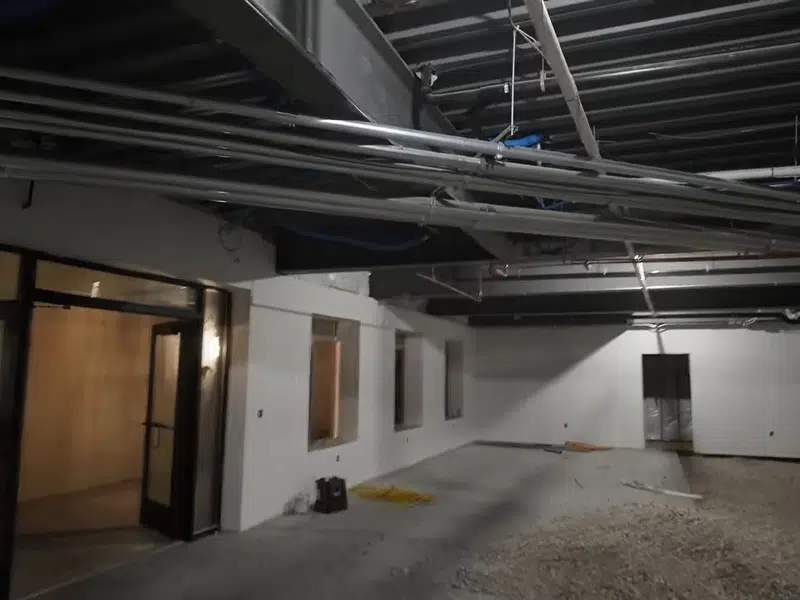 Commercial build-out floor with plumbing rough-in layout for hydro jetting in Stanton