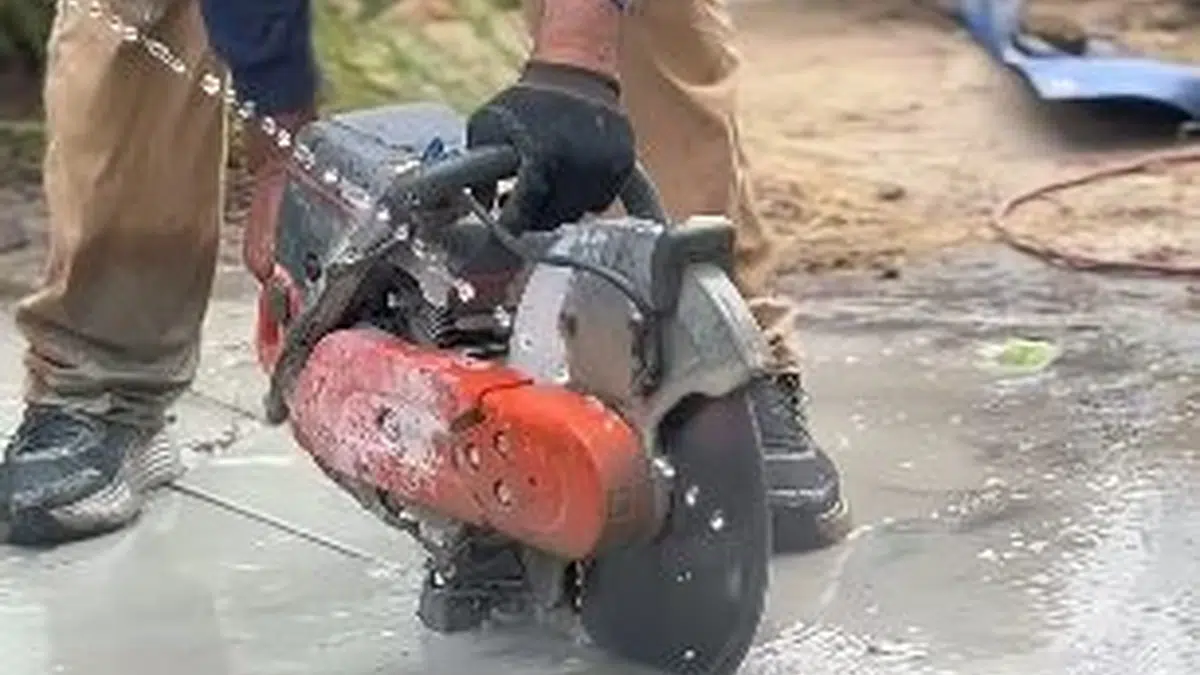 Concrete saw cutting slab for pipe access for slab leak repair cost central homes in Stanton