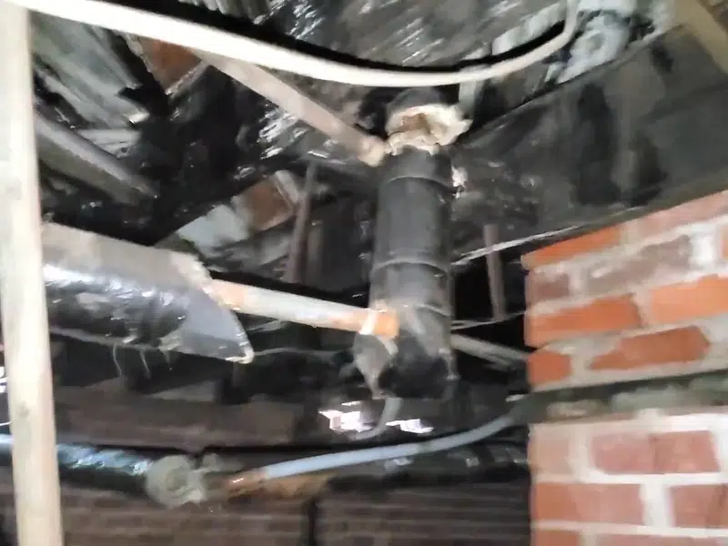Opened floor and framing showing leak-damaged subfloor for huntington beach in Huntington Beach