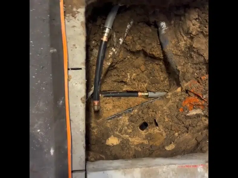 Vertical sewer pipe inside opened wall cavity for south stanton in South Stanton