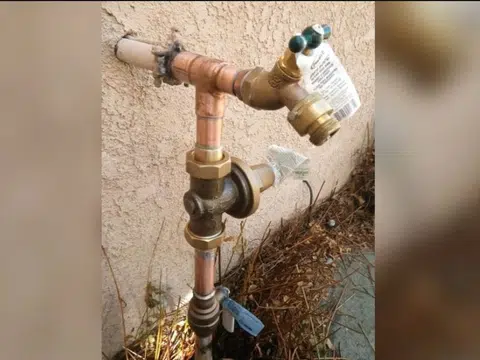 Weathered outdoor hose bib and copper shutoff valve for index in Stanton