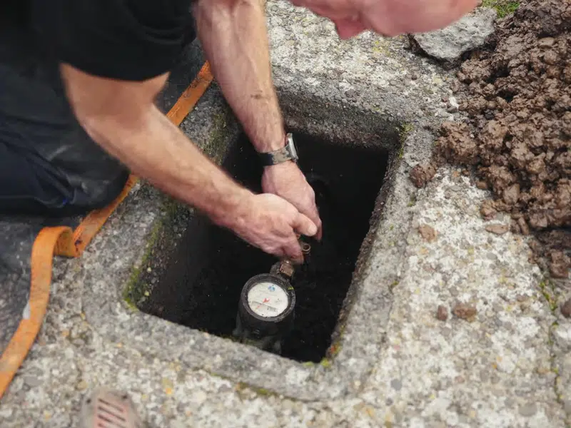 Outdoor water line repair inside ground access box for hoover street area in Hoover Street Area, Stanton
