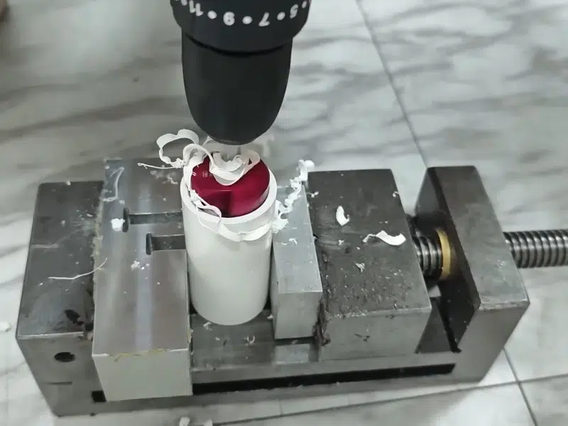 Drill setup cutting opening for pipe fitting for repiping in Stanton