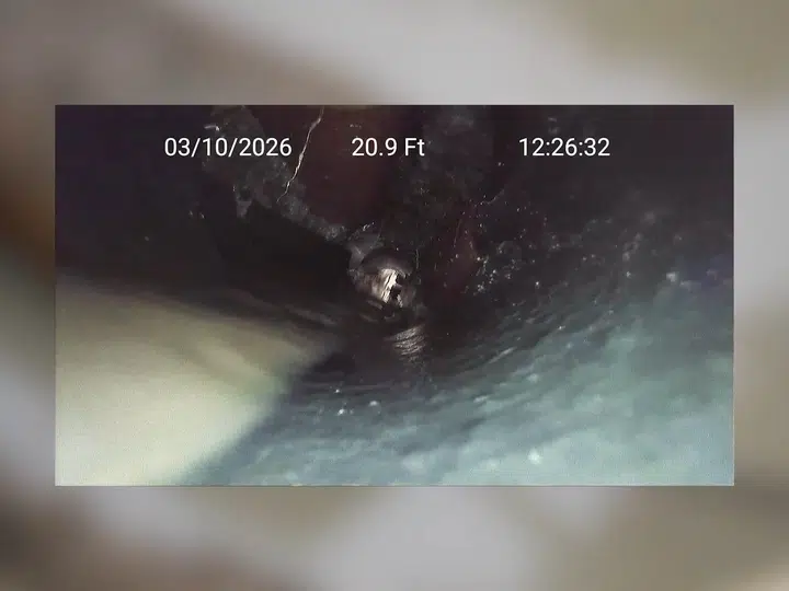 Sewer camera monitor showing inside of drain pipe for sewer line repair in Stanton