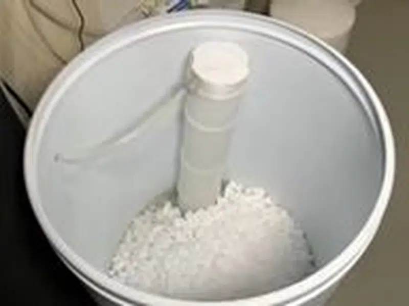 Salt pellets inside a water softener brine tank for stanton central in Stanton Central