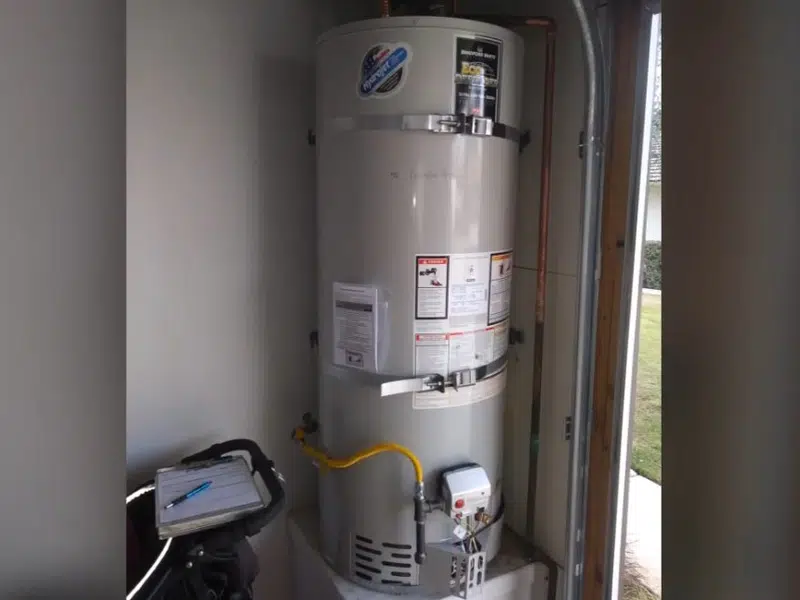 Tank water heater beside service equipment for water heater replacement cost stanton in Stanton