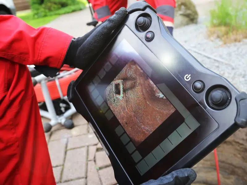Thermal imaging camera used for leak detection for slab leak signs central homes in Stanton shown from a different service angle