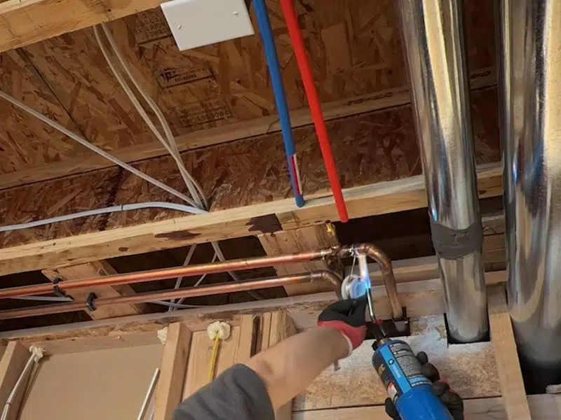 Utility sink supply and drain rough-in in basement ceiling area for los alamitos in Los Alamitos