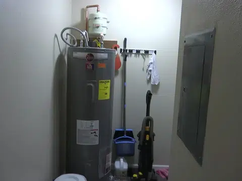 Plumber checking a water heater installation for plumbing blog index in Stanton
