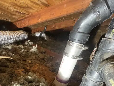 Plumbing repair work area with exposed pipe and tools for index in Stanton for thumb loc downtown stanton 001